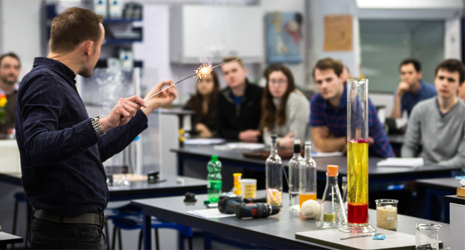Teacher demonstrating a science experiment